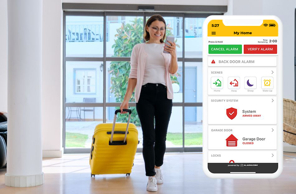 Person traveling checking their security system from the MyGuardianAlarm mobile app