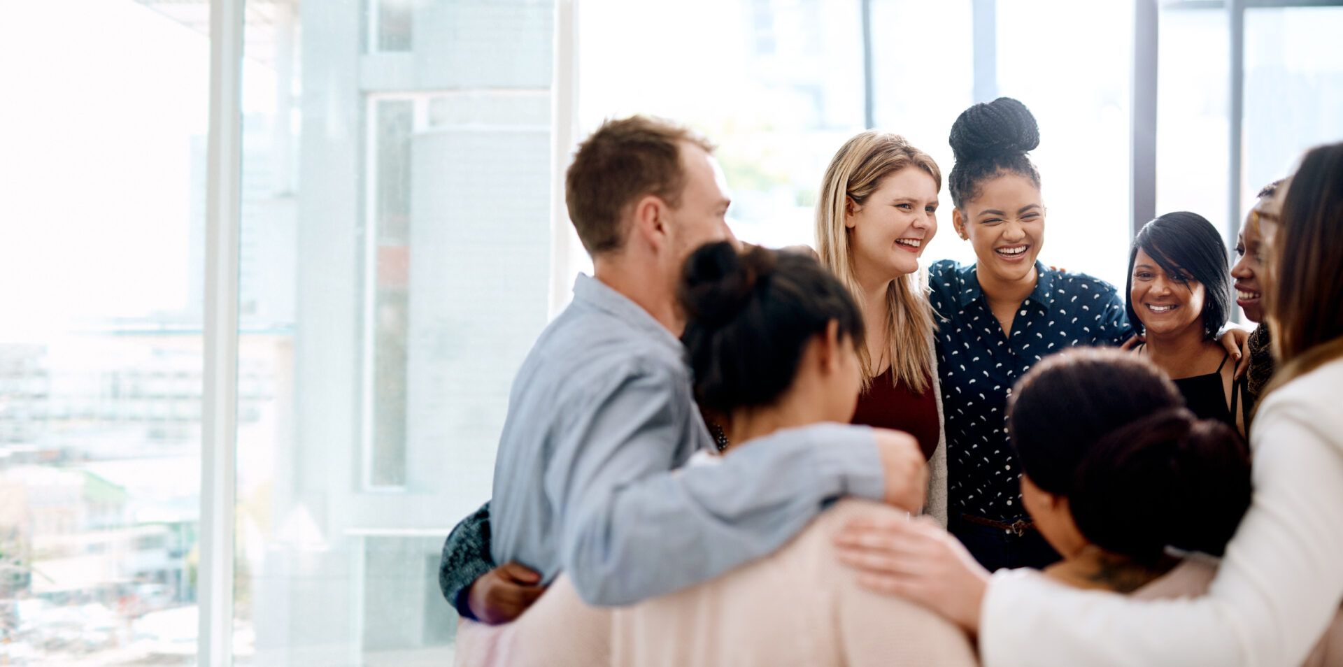 Employees gathering around in the office