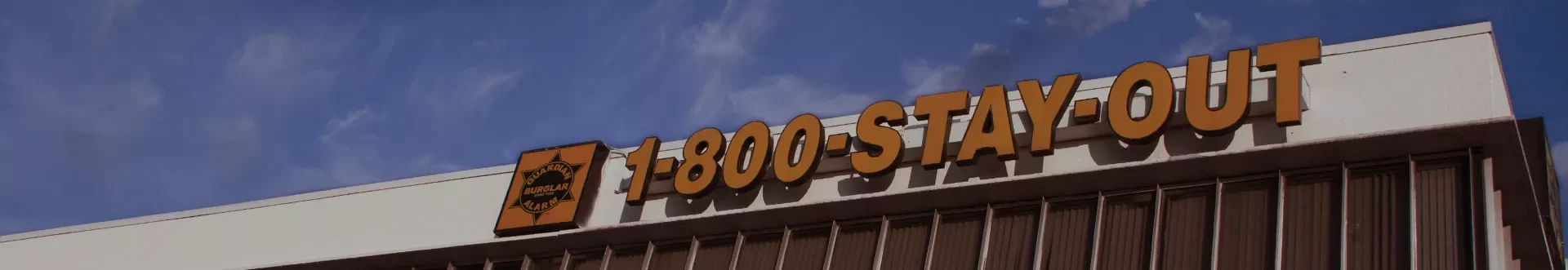Former sign on the Guardian Alarm building