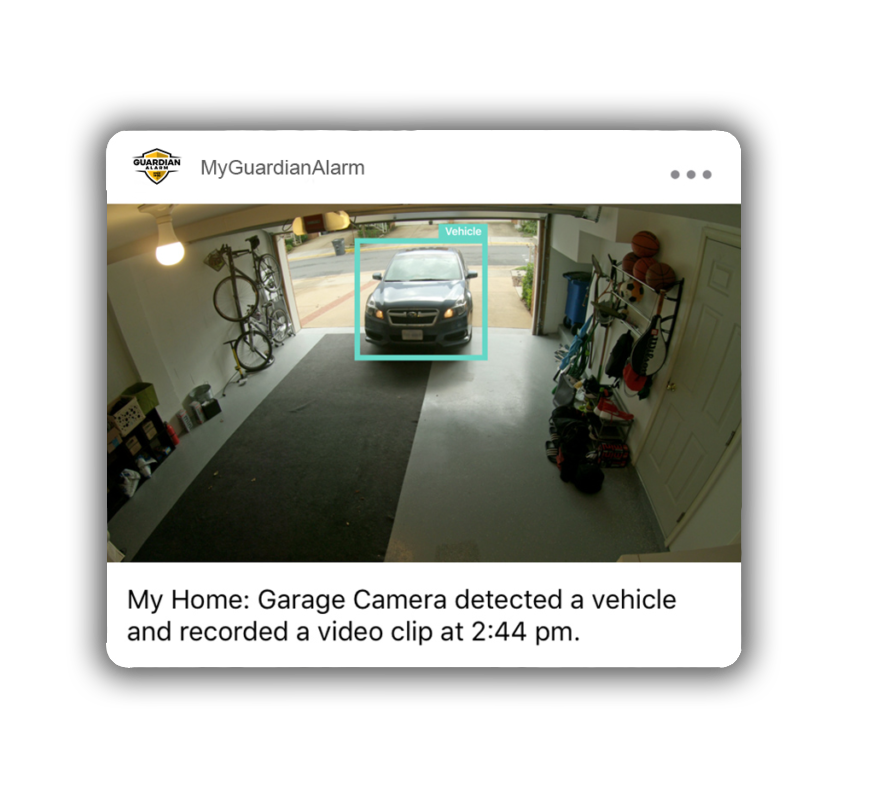 Car pulling into a driveway with My Guardian Alarm notifying home owner.