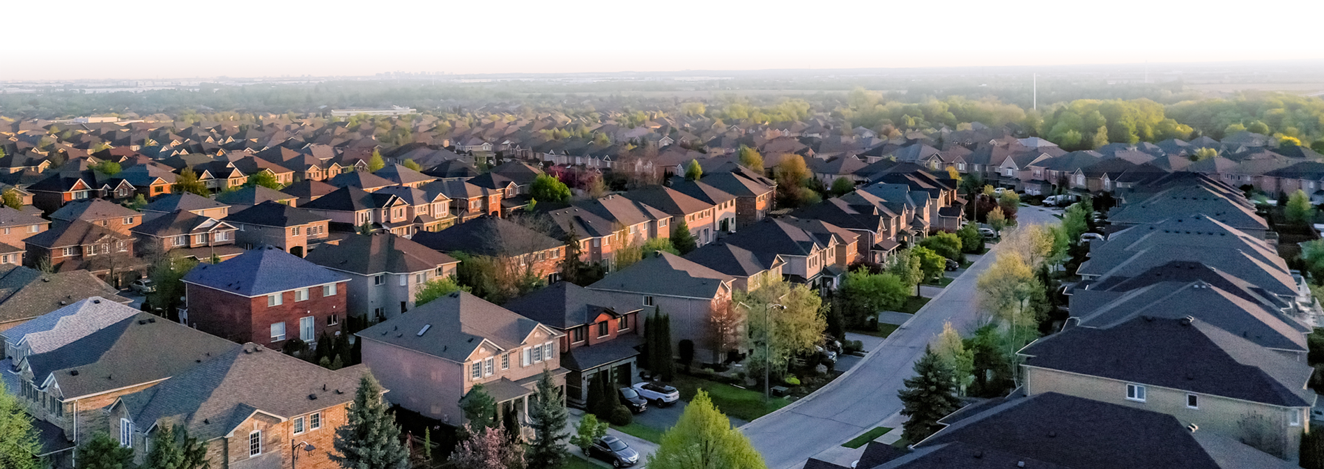 Drone shot of a neighborhood protected by Guardian Alarm wireless cameras and security system