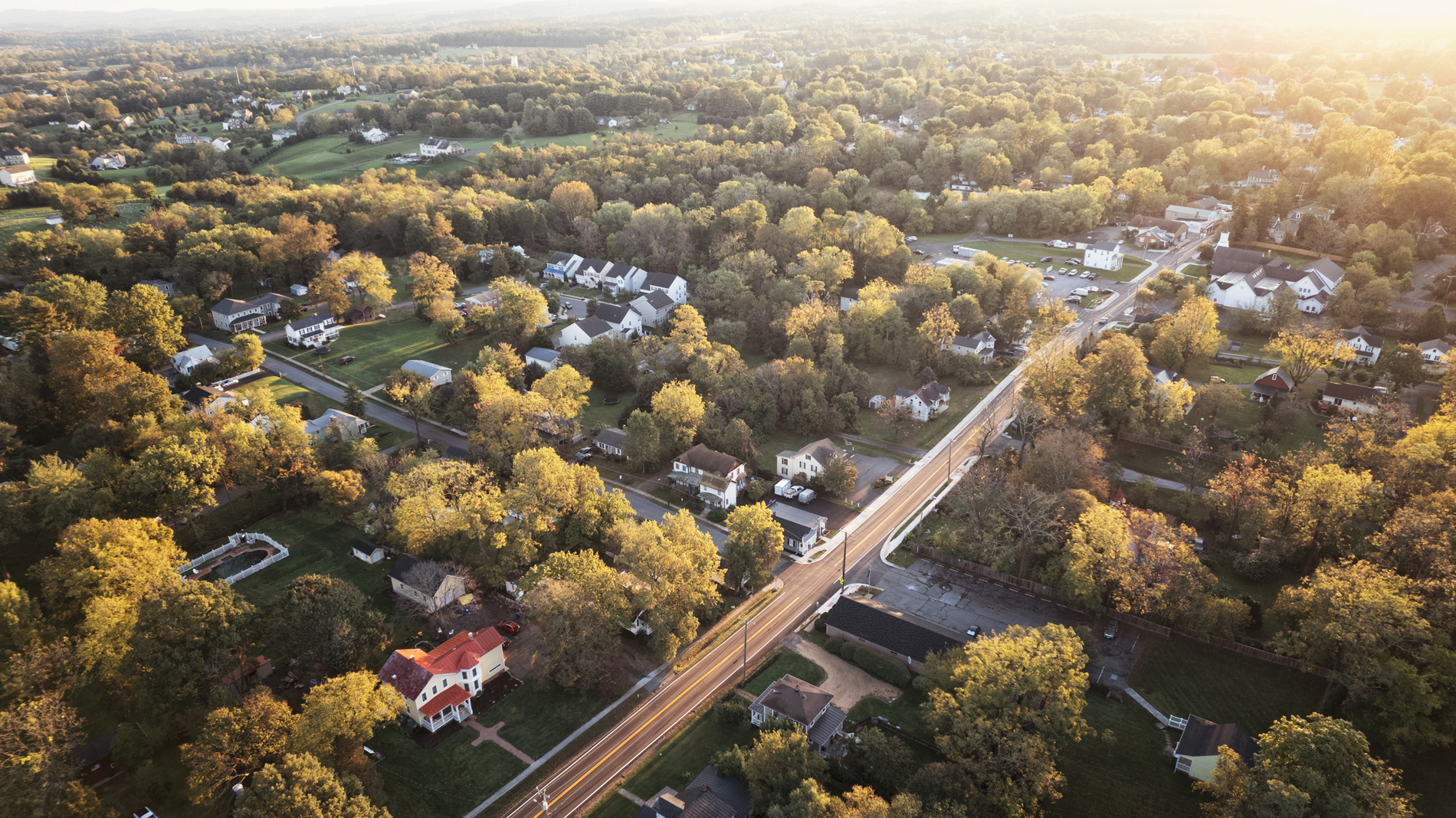 Drone shot of a neighborhood protected by Guardian Alarm wireless cameras and security system